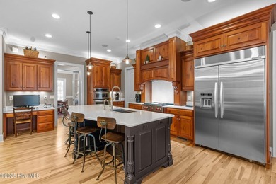 Stately and elegant, this home was built by the highly regarded on Pinewild Country Club of Pinehurst in North Carolina - for sale on GolfHomes.com, golf home, golf lot