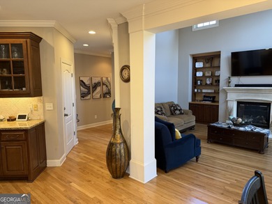 Beautifully positioned on the golf course, this four-sided brick on Canongate At Heron Bay in Georgia - for sale on GolfHomes.com, golf home, golf lot