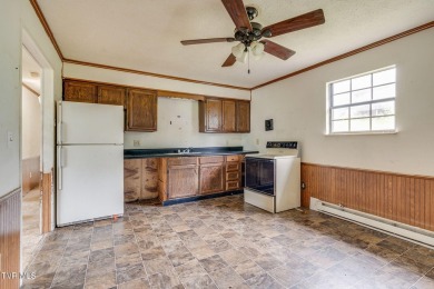 Investment opportunity! This home is loaded with potential. It on Mc Donald Hills Golf Club in Tennessee - for sale on GolfHomes.com, golf home, golf lot