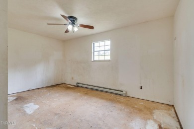 Investment opportunity! This home is loaded with potential. It on Mc Donald Hills Golf Club in Tennessee - for sale on GolfHomes.com, golf home, golf lot