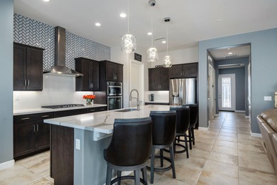 This exceptional, customized PRESERVE plan is in the prestigious on Mission Hills Golf Club in California - for sale on GolfHomes.com, golf home, golf lot