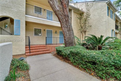 This charming 2-bedroom, 2-bathroom first-floor villa in Port on Port Royal Golf and Racquet Club in South Carolina - for sale on GolfHomes.com, golf home, golf lot