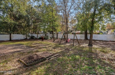 Welcome home to this beautifully well kept 4 bedroom home in the on Ladys Island Country Club in South Carolina - for sale on GolfHomes.com, golf home, golf lot