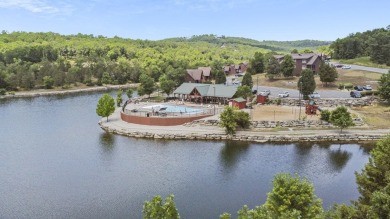 Gorgeous, almost level lot in the prestigious Stonebridge on Ledgestone Country Club and Golf Course in Missouri - for sale on GolfHomes.com, golf home, golf lot