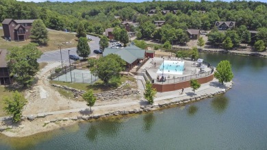 Gorgeous, almost level lot in the prestigious Stonebridge on Ledgestone Country Club and Golf Course in Missouri - for sale on GolfHomes.com, golf home, golf lot