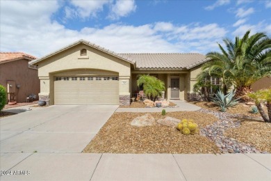 This gorgeous home in a 55+ gated resort offers great curb on Arizona Traditions Golf Club in Arizona - for sale on GolfHomes.com, golf home, golf lot