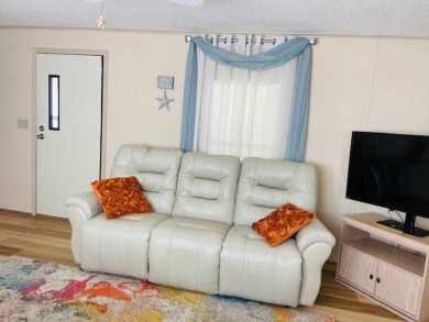 This home is in a 55 plus community with a monthly lot rent of on Crystal Lake Club in Florida - for sale on GolfHomes.com, golf home, golf lot