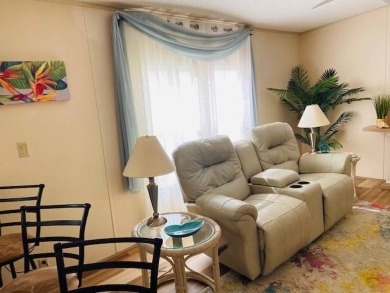 This home is in a 55 plus community with a monthly lot rent of on Crystal Lake Club in Florida - for sale on GolfHomes.com, golf home, golf lot