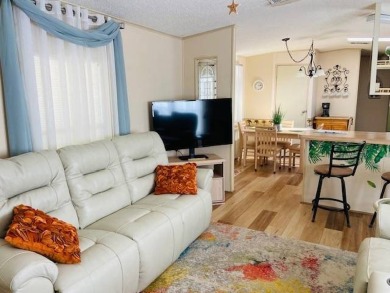 This home is in a 55 plus community with a monthly lot rent of on Crystal Lake Club in Florida - for sale on GolfHomes.com, golf home, golf lot