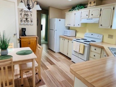 This home is in a 55 plus community with a monthly lot rent of on Crystal Lake Club in Florida - for sale on GolfHomes.com, golf home, golf lot
