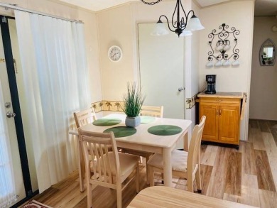 This home is in a 55 plus community with a monthly lot rent of on Crystal Lake Club in Florida - for sale on GolfHomes.com, golf home, golf lot
