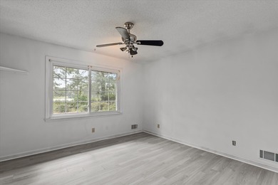 Enjoy golf course living at its finest! This spacious 4-bedroom on Goshen Plantation Golf Club in Georgia - for sale on GolfHomes.com, golf home, golf lot