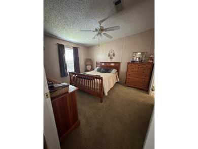 Charming 2-Bedroom Home with Sunroom in a Wonderful on Schalamar Creek Golf and Country Club in Florida - for sale on GolfHomes.com, golf home, golf lot