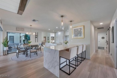 Beautiful 4 bedroom, 2.5 bath pool home on large, elevated lot on Eagle Ridge Golf and Tennis Club in Florida - for sale on GolfHomes.com, golf home, golf lot