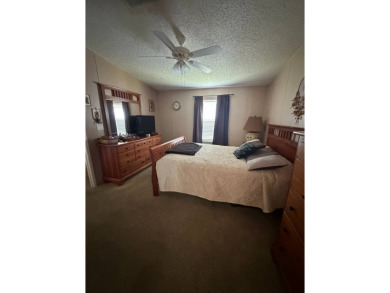 Charming 2-Bedroom Home with Sunroom in a Wonderful on Schalamar Creek Golf and Country Club in Florida - for sale on GolfHomes.com, golf home, golf lot