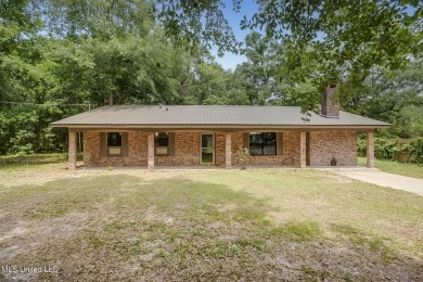 Nestled in the tranquil community of North Gautier, this on Mississippi National Golf Course in Mississippi - for sale on GolfHomes.com, golf home, golf lot