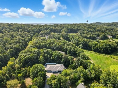Back on the Market - Now at a SMOKING DEAL!! Experience luxury on The Club At Old Kinderhook in Missouri - for sale on GolfHomes.com, golf home, golf lot