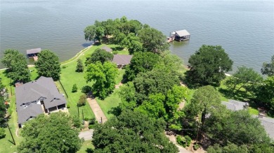 This iconic Star Harbor home sits on one of the largest and most on Star Harbor Golf Club in Texas - for sale on GolfHomes.com, golf home, golf lot