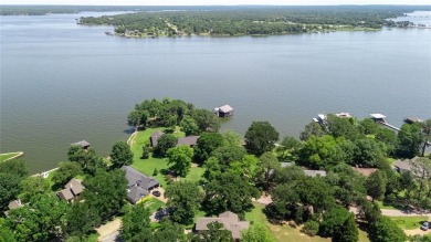 This iconic Star Harbor home sits on one of the largest and most on Star Harbor Golf Club in Texas - for sale on GolfHomes.com, golf home, golf lot