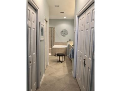 Experience the ideal Florida lifestyle in this impeccable on Venetian Golf and River Club in Florida - for sale on GolfHomes.com, golf home, golf lot