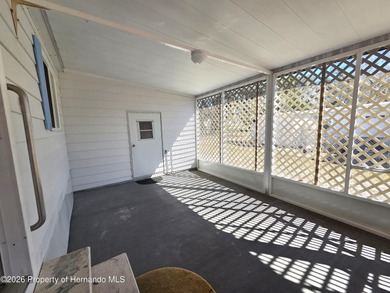 GOLF COURSE HOME WITH NEW ROOF! 2 BEDROOMS AND 2 BATHROOMS PLUS on High Point Golf Club, Inc. in Florida - for sale on GolfHomes.com, golf home, golf lot