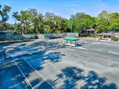 Captivating Views on Crispin Court. Located within the on The Meadows Golf and Country Club in Florida - for sale on GolfHomes.com, golf home, golf lot