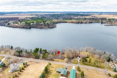 Experience the epitome of lakeside luxury with this captivating on Lake Wissota Golf Course in Wisconsin - for sale on GolfHomes.com, golf home, golf lot