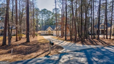 New Construction in Reynolds Lake Oconee! Located Between Hole on Reynolds Lake Oconee - The Oconee in Georgia - for sale on GolfHomes.com, golf home, golf lot