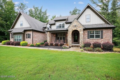 This stunning 4-bedroom, 3.5-bath home on 1.3 acres offers the on The Club River Forest in Georgia - for sale on GolfHomes.com, golf home, golf lot