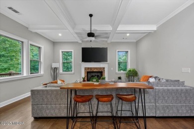 This stunning 4-bedroom, 3.5-bath home on 1.3 acres offers the on The Club River Forest in Georgia - for sale on GolfHomes.com, golf home, golf lot