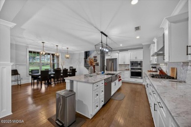 This stunning 4-bedroom, 3.5-bath home on 1.3 acres offers the on The Club River Forest in Georgia - for sale on GolfHomes.com, golf home, golf lot