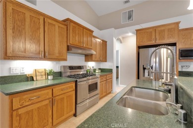 Step into this beautifully maintained 3-bedroom, 2-bathroom home on Silver Lakes Golf Course in California - for sale on GolfHomes.com, golf home, golf lot
