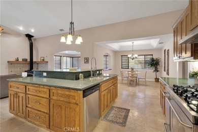 Step into this beautifully maintained 3-bedroom, 2-bathroom home on Silver Lakes Golf Course in California - for sale on GolfHomes.com, golf home, golf lot