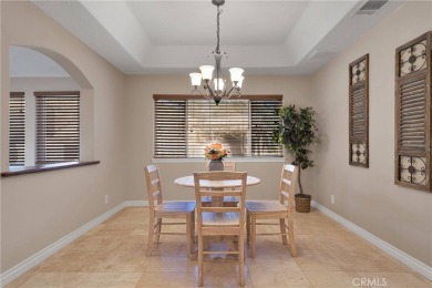 Step into this beautifully maintained 3-bedroom, 2-bathroom home on Silver Lakes Golf Course in California - for sale on GolfHomes.com, golf home, golf lot