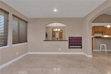 Step into this beautifully maintained 3-bedroom, 2-bathroom home on Silver Lakes Golf Course in California - for sale on GolfHomes.com, golf home, golf lot