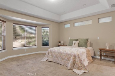 Step into this beautifully maintained 3-bedroom, 2-bathroom home on Silver Lakes Golf Course in California - for sale on GolfHomes.com, golf home, golf lot