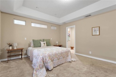 Step into this beautifully maintained 3-bedroom, 2-bathroom home on Silver Lakes Golf Course in California - for sale on GolfHomes.com, golf home, golf lot