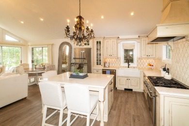 Enjoy this exquisite & completely remodeled French Country style on Geneva National Golf Club in Wisconsin - for sale on GolfHomes.com, golf home, golf lot