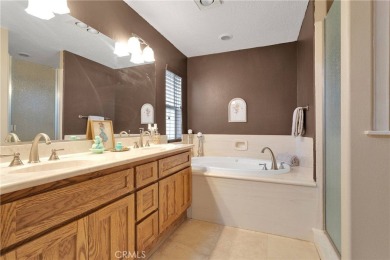 Step into this beautifully maintained 3-bedroom, 2-bathroom home on Silver Lakes Golf Course in California - for sale on GolfHomes.com, golf home, golf lot