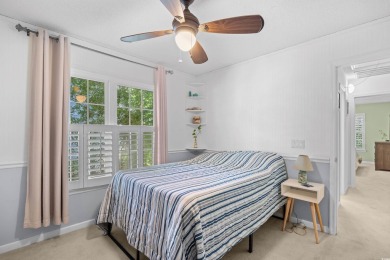 Nestled on a quiet cul-de-sac in The Bluffs at Pawleys Island on Pawleys Plantation Golf and Country Club in South Carolina - for sale on GolfHomes.com, golf home, golf lot