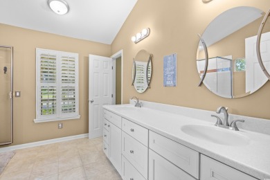 Nestled on a quiet cul-de-sac in The Bluffs at Pawleys Island on Pawleys Plantation Golf and Country Club in South Carolina - for sale on GolfHomes.com, golf home, golf lot