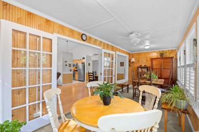 Nestled on a quiet cul-de-sac in The Bluffs at Pawleys Island on Pawleys Plantation Golf and Country Club in South Carolina - for sale on GolfHomes.com, golf home, golf lot