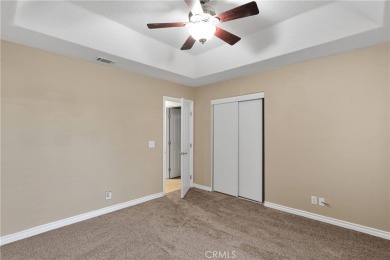 Step into this beautifully maintained 3-bedroom, 2-bathroom home on Silver Lakes Golf Course in California - for sale on GolfHomes.com, golf home, golf lot