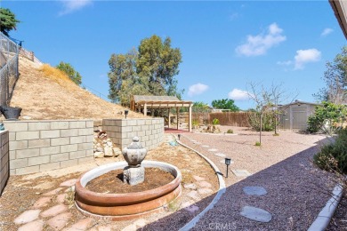 Step into this beautifully maintained 3-bedroom, 2-bathroom home on Silver Lakes Golf Course in California - for sale on GolfHomes.com, golf home, golf lot