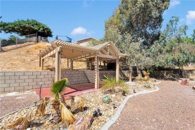 Step into this beautifully maintained 3-bedroom, 2-bathroom home on Silver Lakes Golf Course in California - for sale on GolfHomes.com, golf home, golf lot