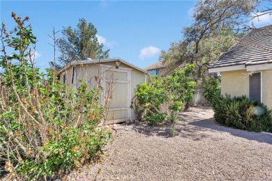 Step into this beautifully maintained 3-bedroom, 2-bathroom home on Silver Lakes Golf Course in California - for sale on GolfHomes.com, golf home, golf lot
