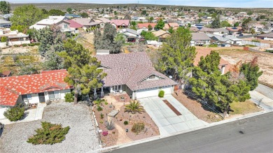 Step into this beautifully maintained 3-bedroom, 2-bathroom home on Silver Lakes Golf Course in California - for sale on GolfHomes.com, golf home, golf lot