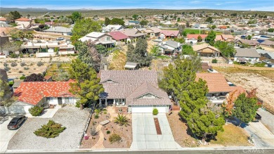 Step into this beautifully maintained 3-bedroom, 2-bathroom home on Silver Lakes Golf Course in California - for sale on GolfHomes.com, golf home, golf lot