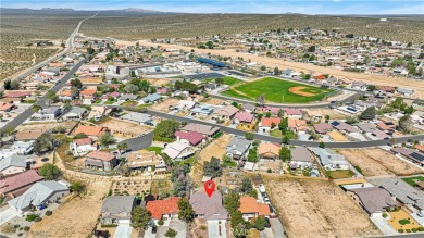 Step into this beautifully maintained 3-bedroom, 2-bathroom home on Silver Lakes Golf Course in California - for sale on GolfHomes.com, golf home, golf lot
