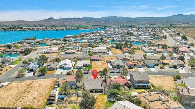 Step into this beautifully maintained 3-bedroom, 2-bathroom home on Silver Lakes Golf Course in California - for sale on GolfHomes.com, golf home, golf lot